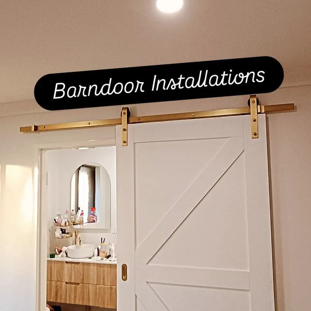 Barn door installation into a bathroom
