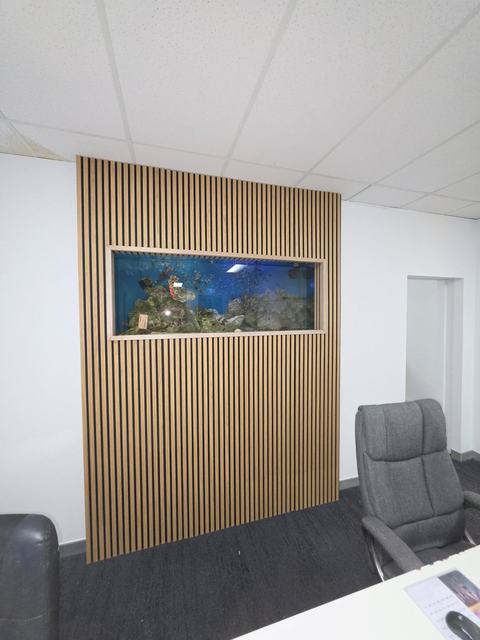 Timber slat feature wall with built-in aquarium