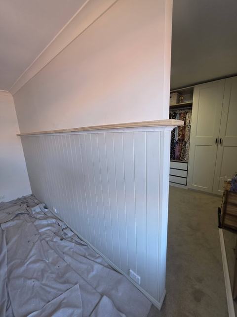V-groove wainscoting in a bedroom