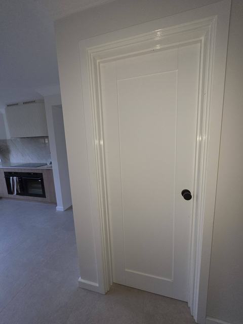 White internal door hung and trimmed