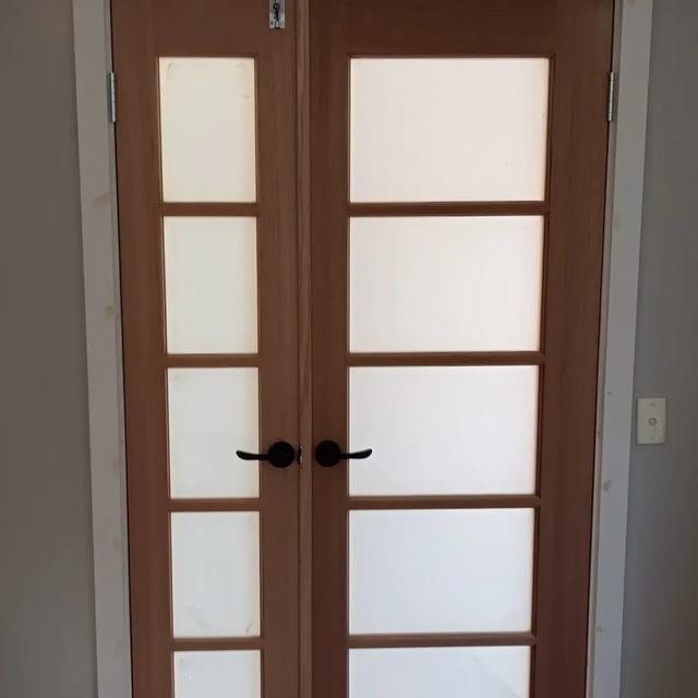Timber French doors with frosted glass