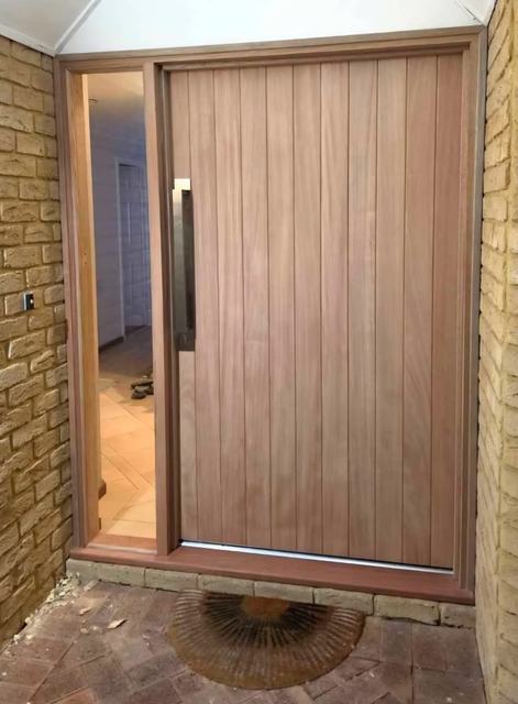 Wide timber entry door with long pull handle