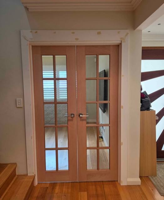 Timber French doors with glass panes