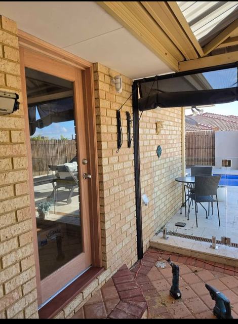 Timber patio door onto a covered alfresco