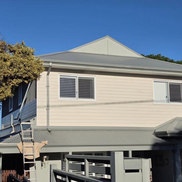 Two-storey cladding and eaves