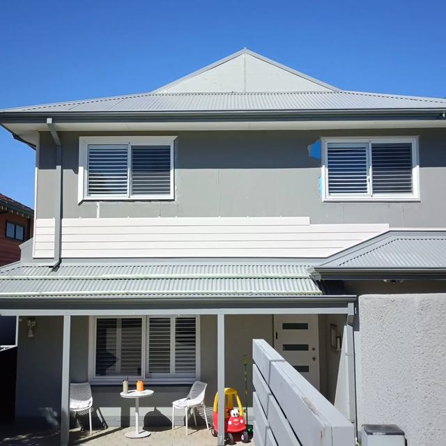 Finished cladding on a two-storey home