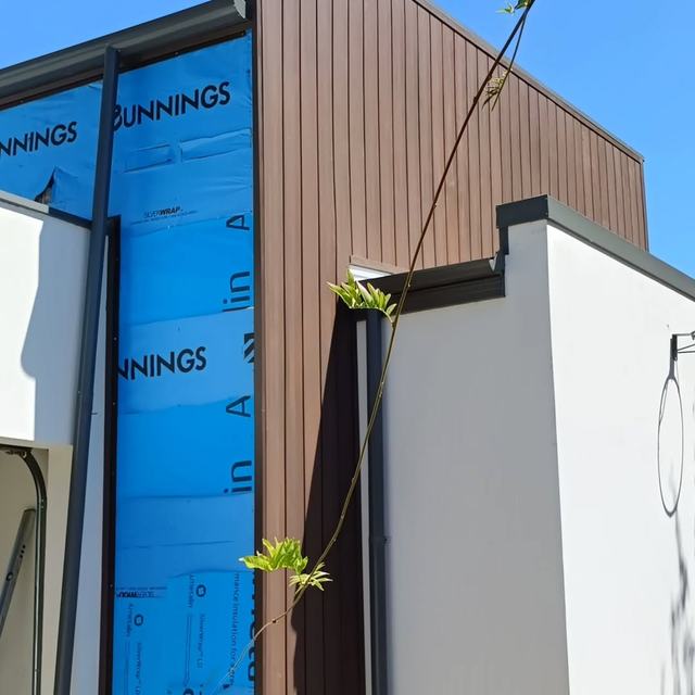Wall wrapped before cladding