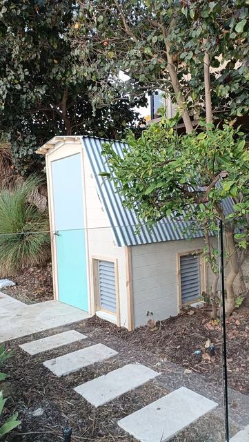 Garden shed with louvred vent