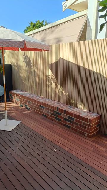Hardwood deck with brick planter