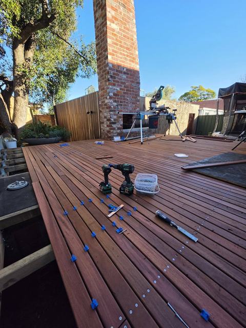 Hardwood decking being laid