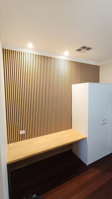 Study nook with timber slat wall and built-in desk